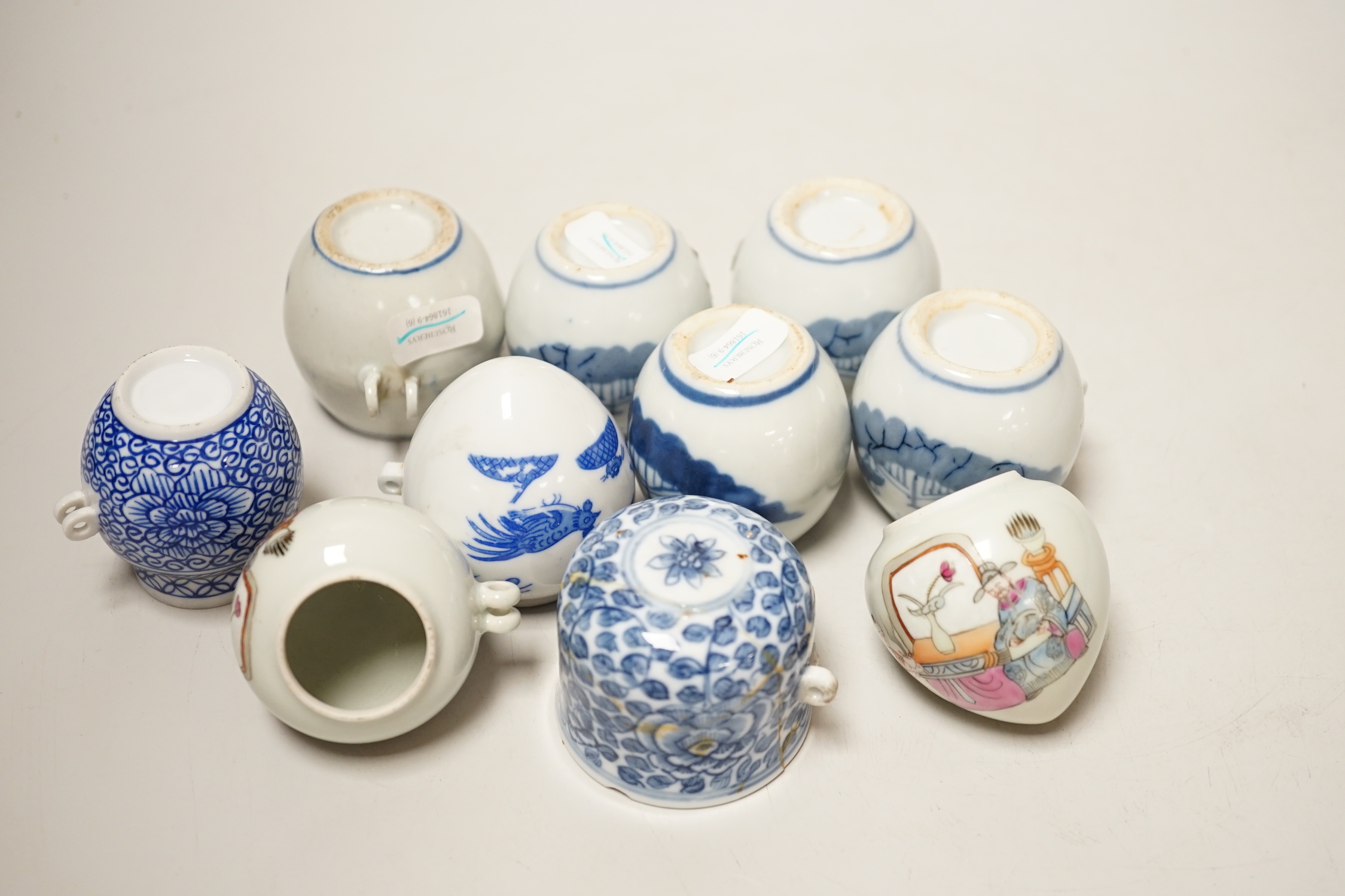 Ten Chinese porcelain bird feeders, 19th/20th century, 4.5cm